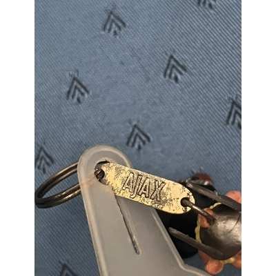 Asterix keychain with Ajax keys, complete with its original holder